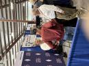 ARRL CEO David Minster, NA2AA (left) and President Rick Roderick, K5UR (right) talk with a member at the ARRL Expo Meet & Greet area.